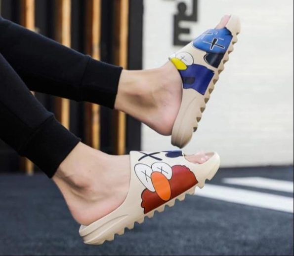 ADIDAS YEEZY KAWS SLIDES - Image 2
