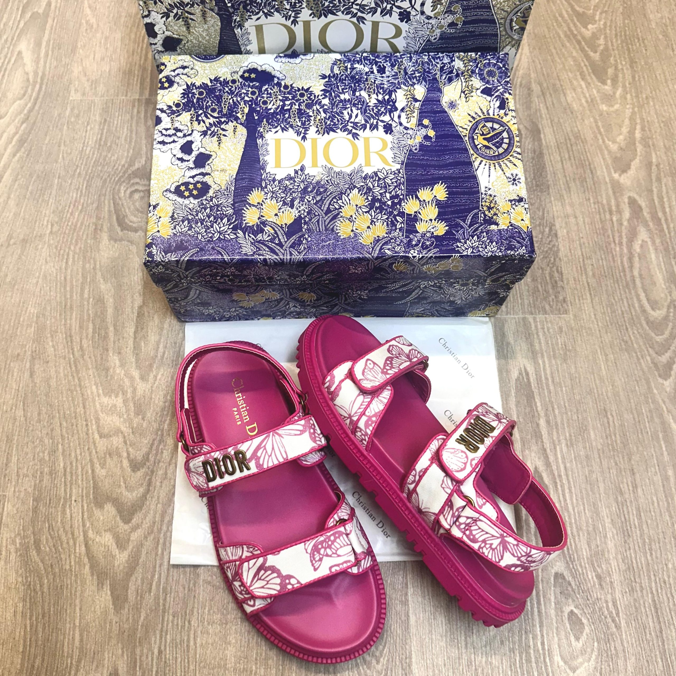 Dior Act Women Butterfly Allover Motif Pink Sandals 7a Quality Replicas are the first copy products such as copycats shoes, watches, clothing, bags, and electronics. Dior Act Women Butterfly Allover Motif Pink Sandals - Image 4