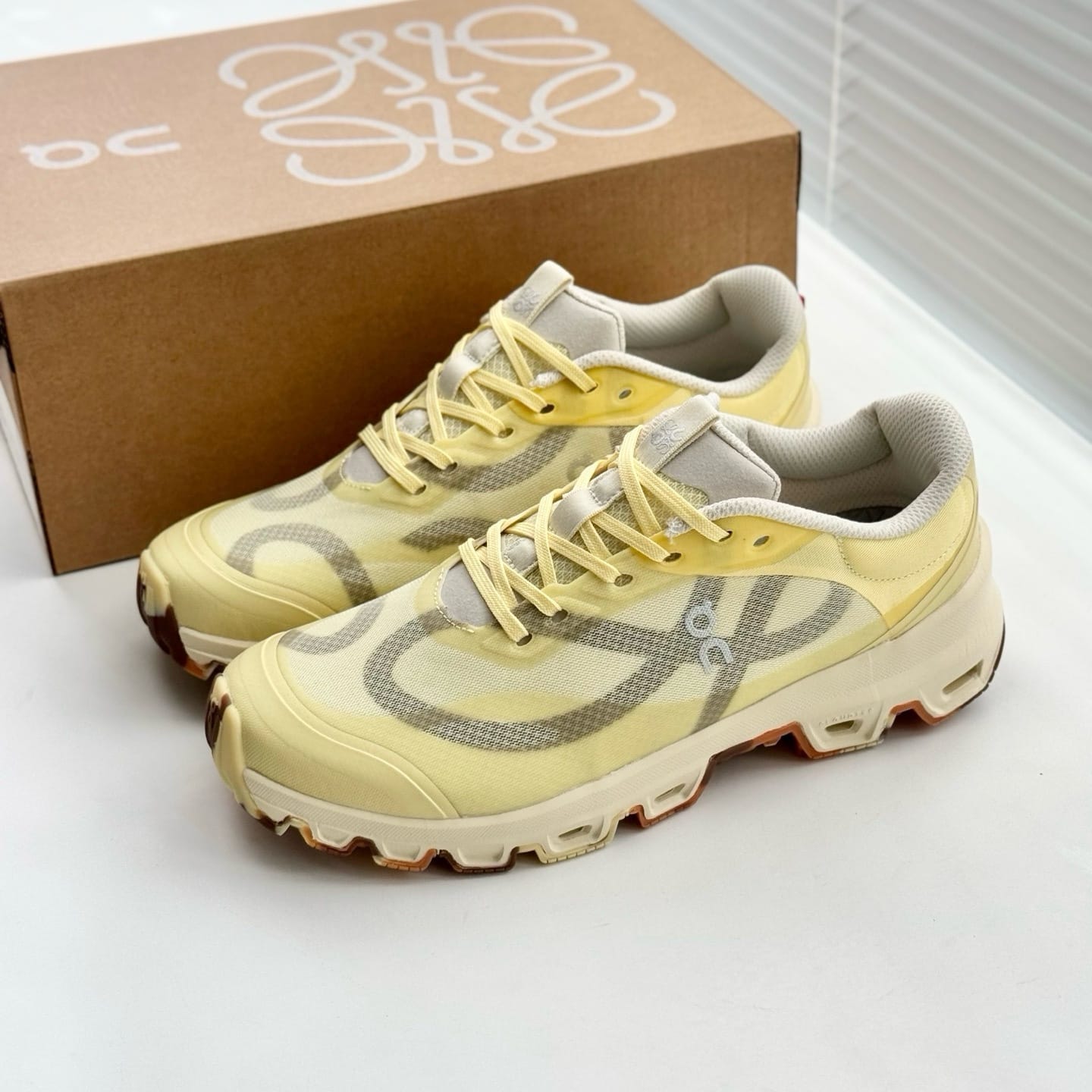 On Running Cloudventure x Loewe Yellow Tan Grey 7a Quality Replicas are the first copy products such as copycats shoes, watches, clothing, bags, and electronics. On Running Cloudventure x Loewe Yellow Tan Grey - Image 5