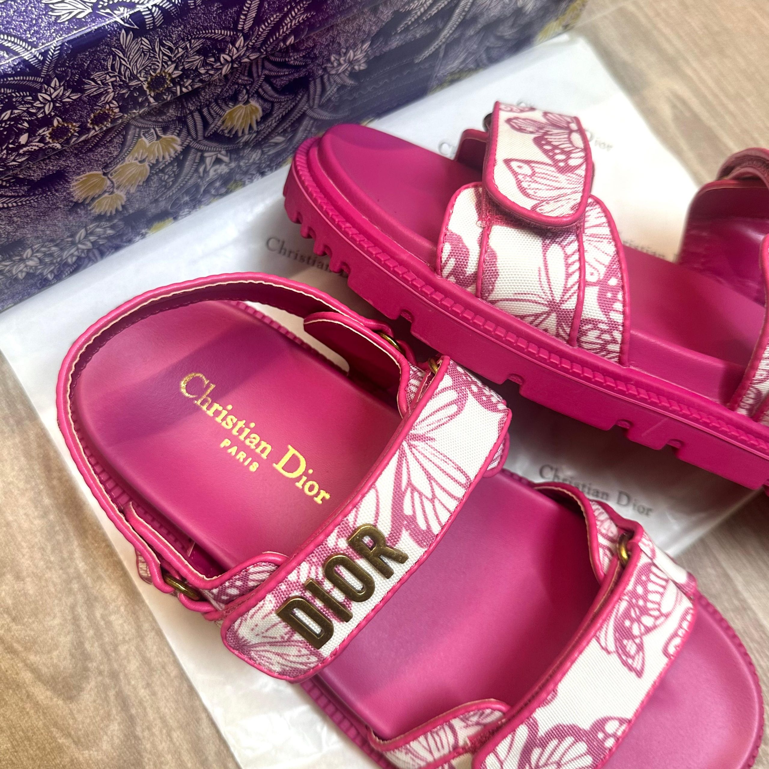 Dior Act Women Butterfly Allover Motif Pink Sandals 7a Quality Replicas are the first copy products such as copycats shoes, watches, clothing, bags, and electronics. Dior Act Women Butterfly Allover Motif Pink Sandals - Image 5