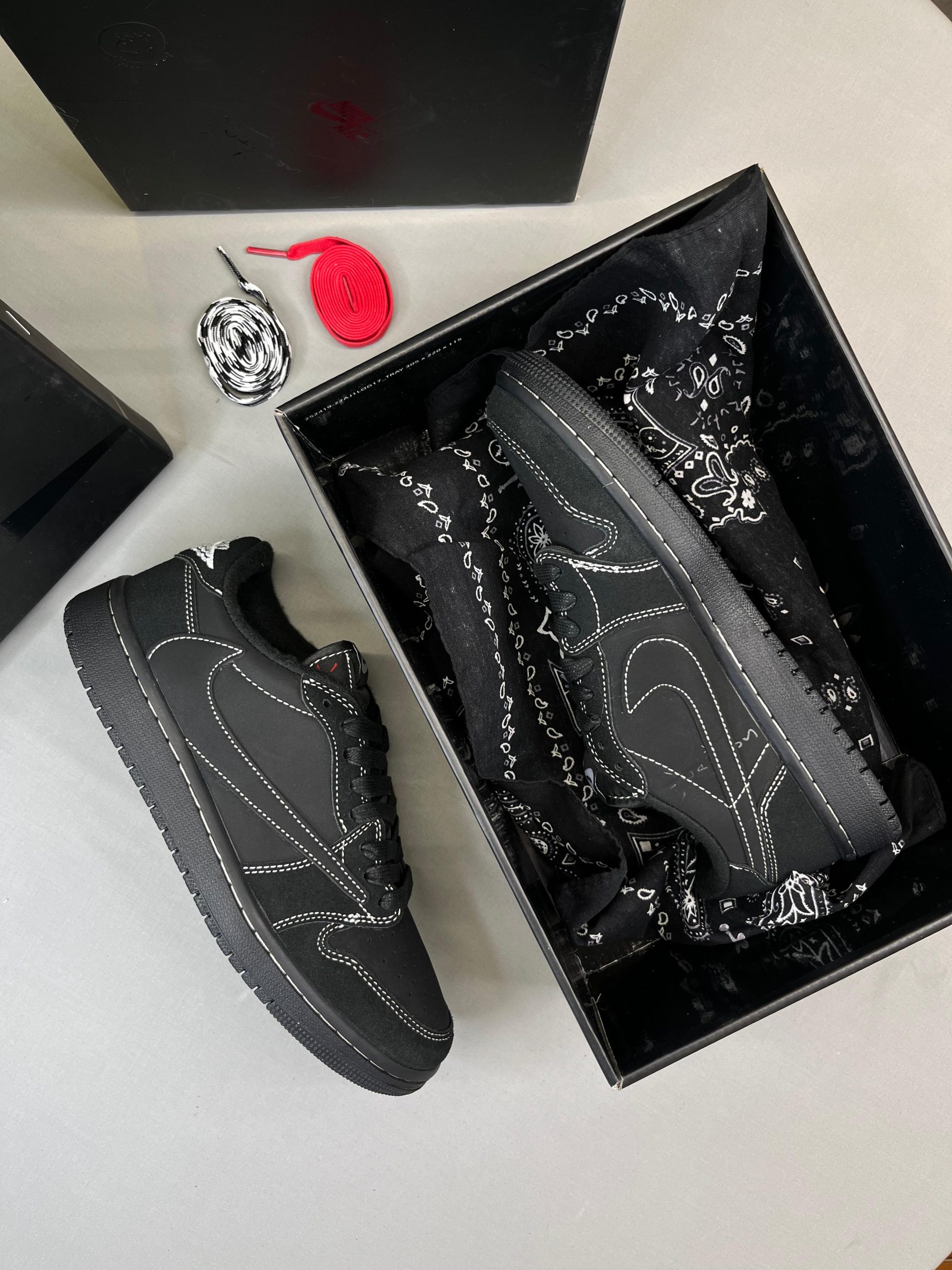 Semi UA Travis Scott X Air Jordan 1 Low OG Black Phantom With Full Kit 7a Quality Replicas are the first copy products such as copycats shoes, watches, clothing, bags, and electronics. Semi UA Travis Scott X Air Jordan 1 Low OG Black Phantom With Full Kit - Image 6
