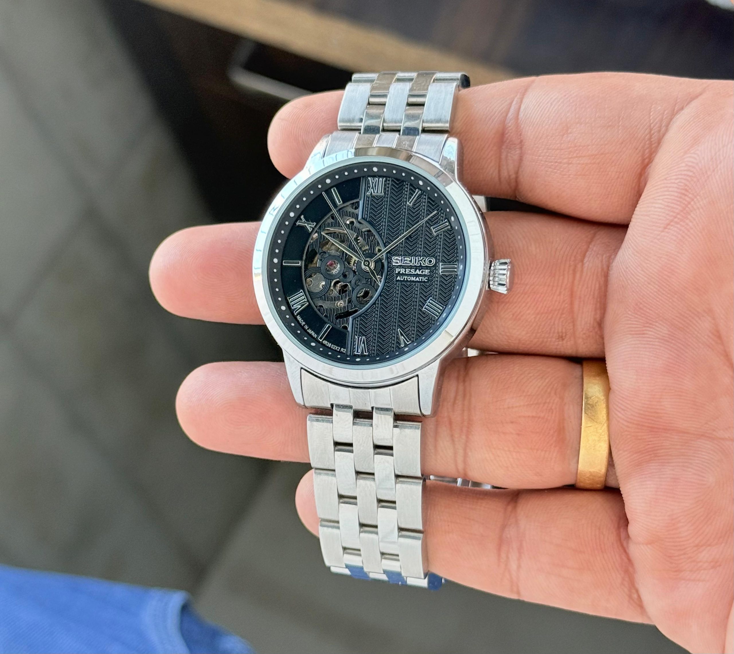 Seiko Presage Classic Series Open Heart 7a Quality Replicas are the first copy products such as copycats shoes, watches, clothing, bags, and electronics. Seiko Presage Classic Series Open Heart - Image 2